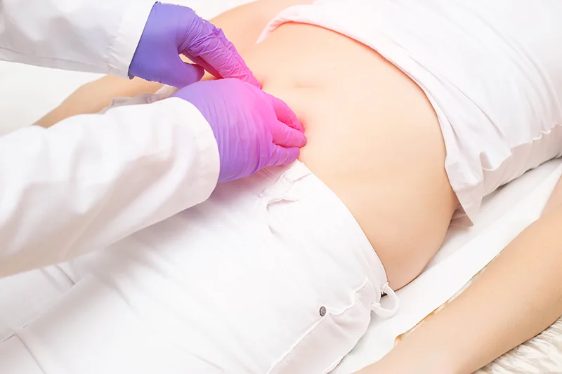 A woman receiving treatment for her hernia