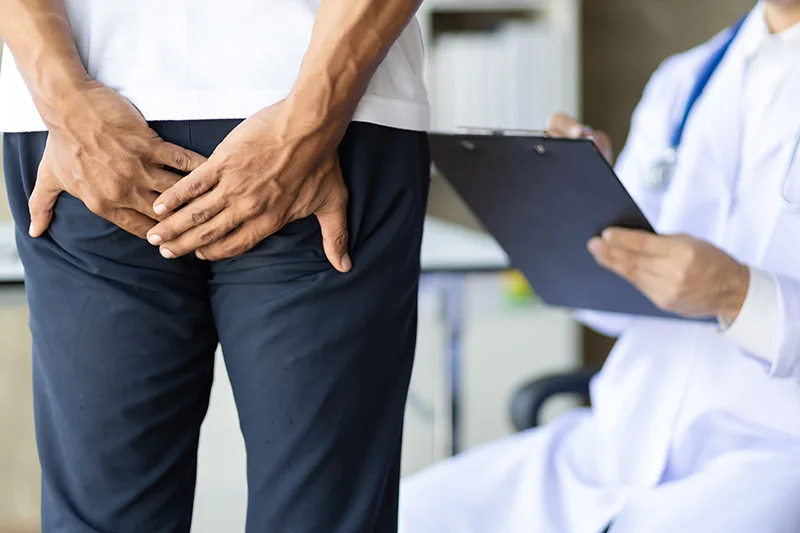 A man seeking specialist care for effective relief from piles